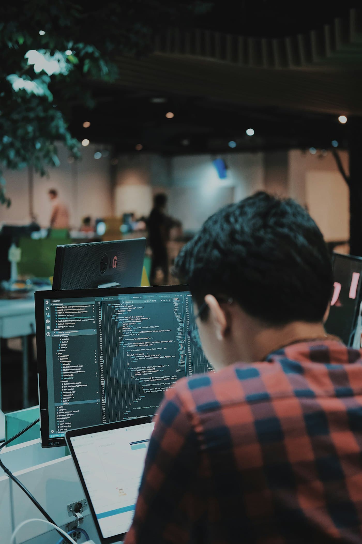 Developer writing code at a desk
